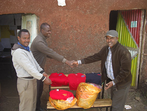 Handing_over_uniforms_s.jpg